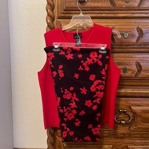 2 piece garment set, size 16. Red sweater and black pants with red flower detail